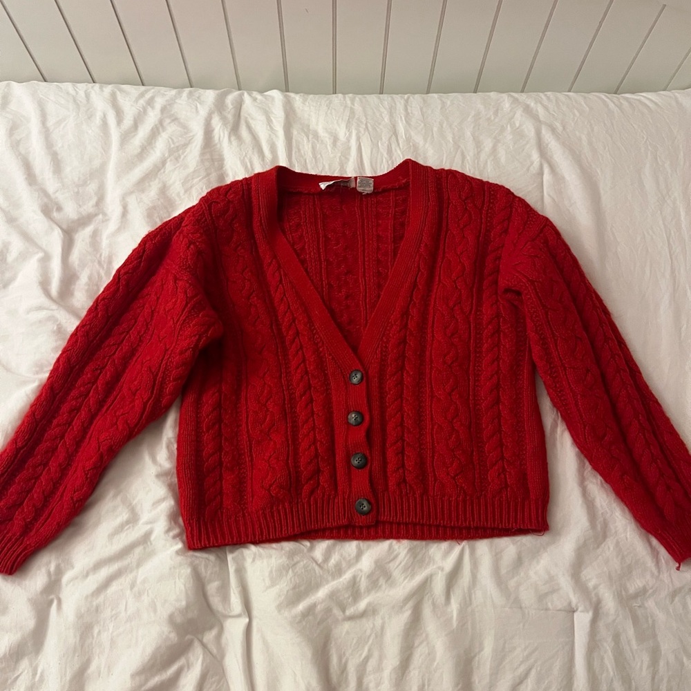 A medium red button-up cardigan from Autograph American Clothing